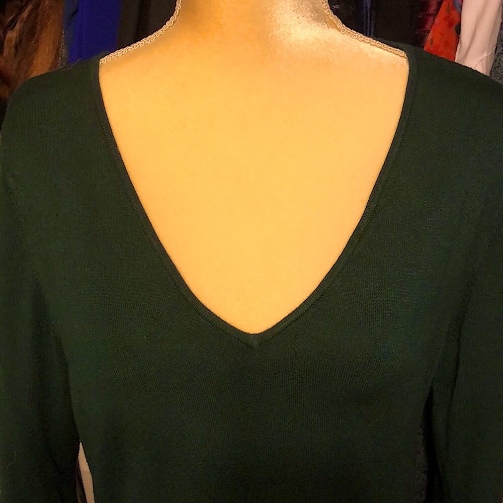 INC Green v neck sweater with silver embellishments on bell sleeve